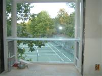 Catch a glimse of the tennis courts